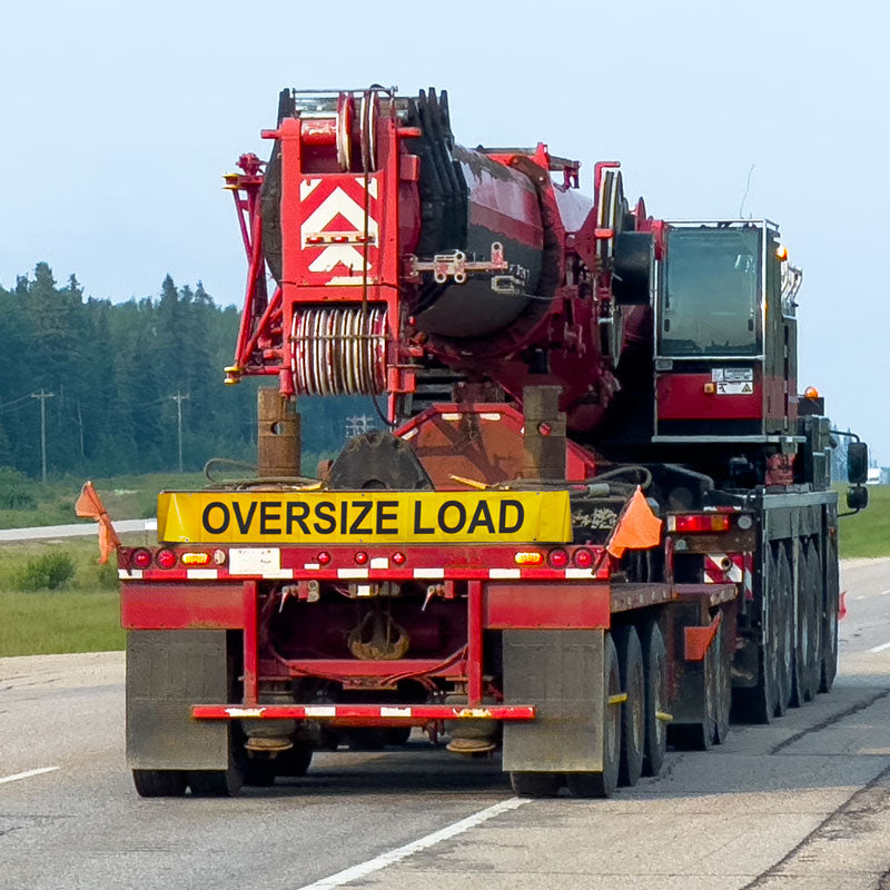 OVERSIZE LOAD banner on truck
